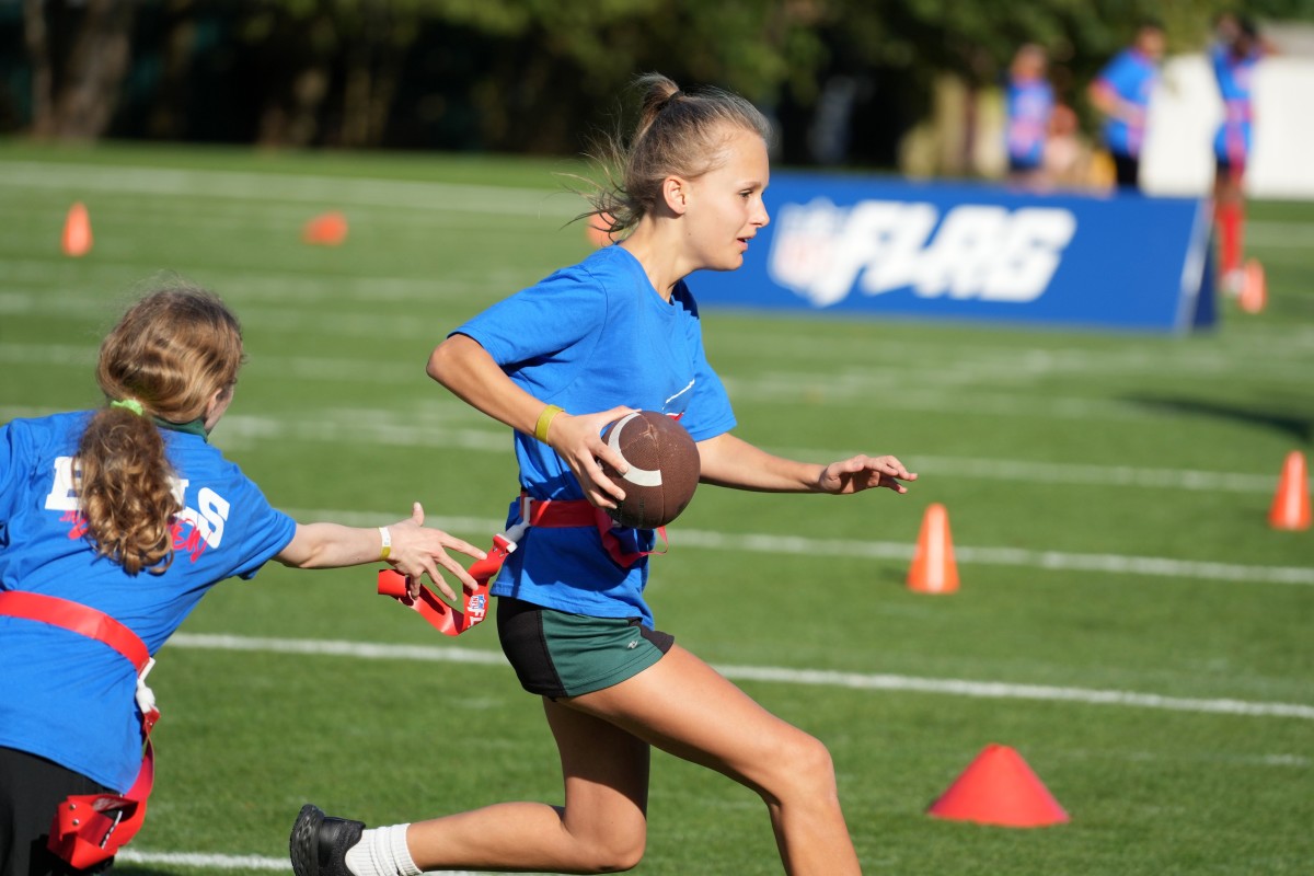 Oct 6, 2023; Watford, United Kingdom; Girls participate in a NFL Flag football event at The Grove Hotel. Mandatory Credit: Kirby Lee-USA TODAY Sports